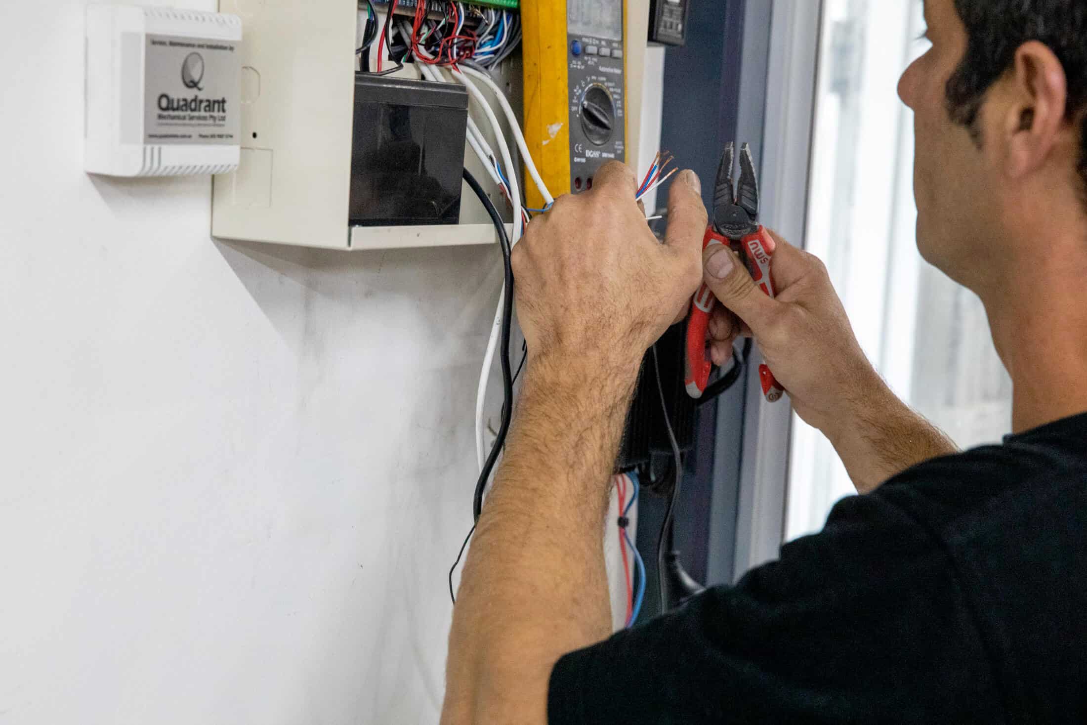 Man fixing electrical wires